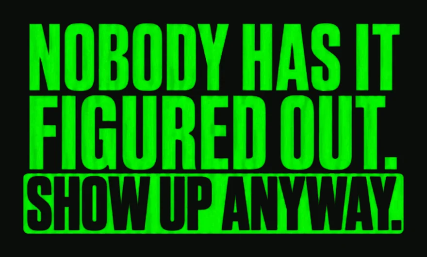 Nobody Has It Figured Out. Show Up Anyway. tee design in stacked neon green type